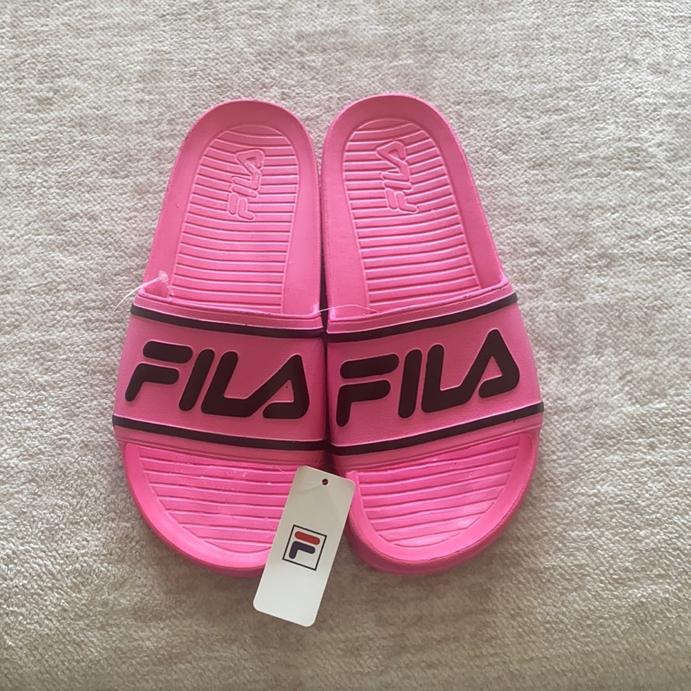 Hot pink Fila slides